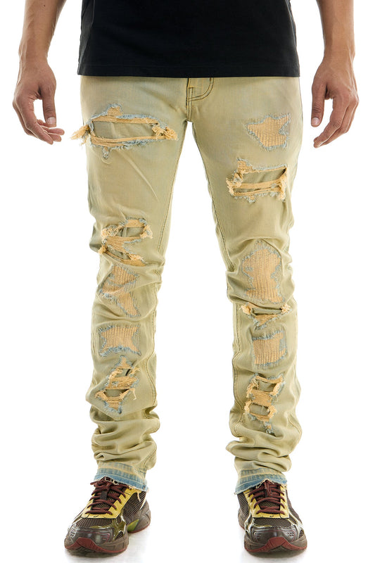 بنطال جينز أصفر اللون من قماش الدنيم المطاطي المغسول