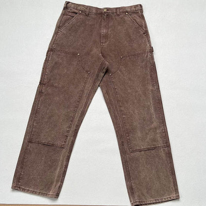 Vintage washed and distressed Carhartt work jeans