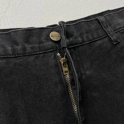 Vintage washed and distressed Carhartt work jeans