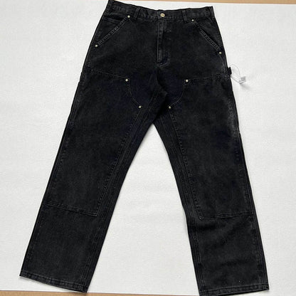 Vintage washed and distressed Carhartt work jeans